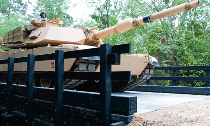 Tank Driving Over Composite Plastic Bridge